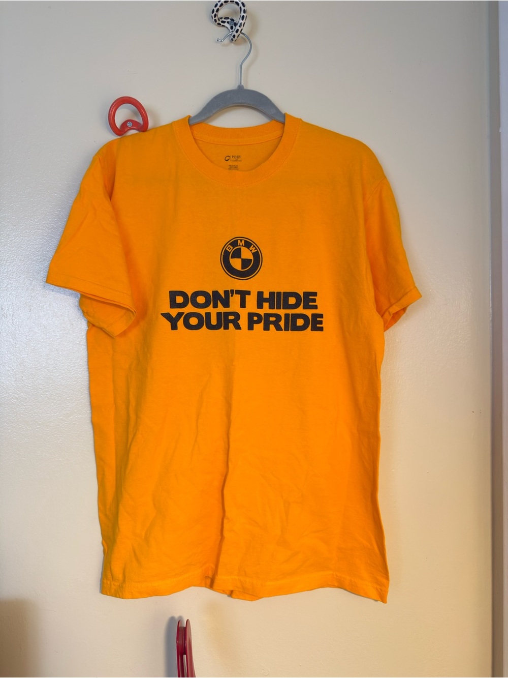 BMW Men's Bright Orange Graphic Tee with Bold Black Logo